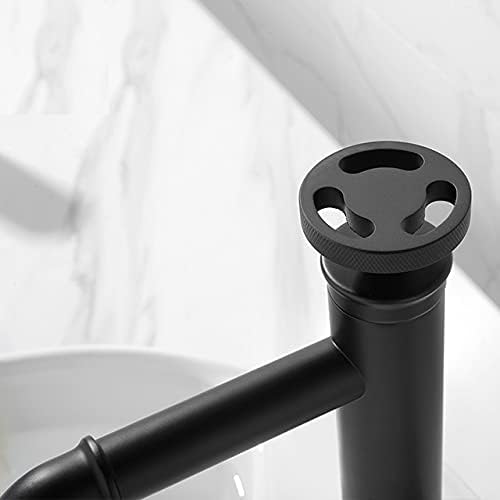 Black basin mixer tap with hot and cold basin mixer control, side angle view for washroom basin