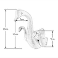 Designer taps for wash basin, matte black swan neck single hole basin mixer tap, side angle view