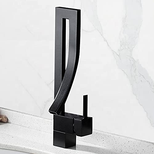 InArt black tap for wash basin installed in modern bathroom interior, single lever basin tap in matt black