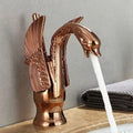 Close-up of InArt brass basin tap with polished rose gold coating, single hole deck mount mixer detail