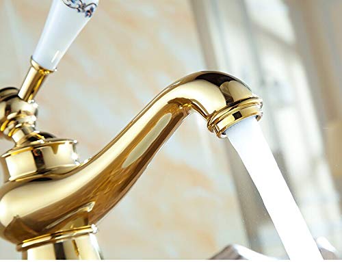 Golden tap for wash basin with single lever control, angled view of brass basin mixer tap