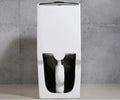 Back and base view of ceramic one piece closet commode showing concealed trapway, glossy black and white