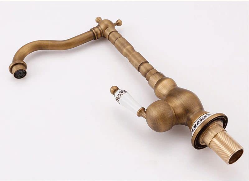 Antique bronze wash basin mixer single lever installed on countertop basin, modern bathroom interior styling