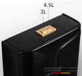 Black glossy ceramic western toilet commode with oval bowl, floor mounted S-trap outlet close-up