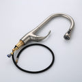 Tap with spray showing pull-down hose and single lever handle, stainless steel brushed chrome