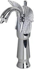 Brass hot and cold water mixer for wash basin, silver high neck tap installed in modern bathroom setting