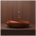 Ceramic table top wash basin counter design in copper colour, rectangular vanity basin, side angle