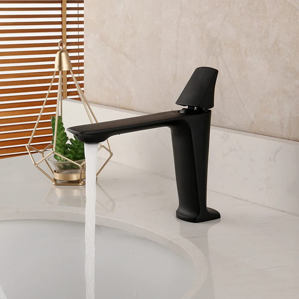 InArt wash basin mixer single lever installed on bathroom wash basin, modern black basin tap look