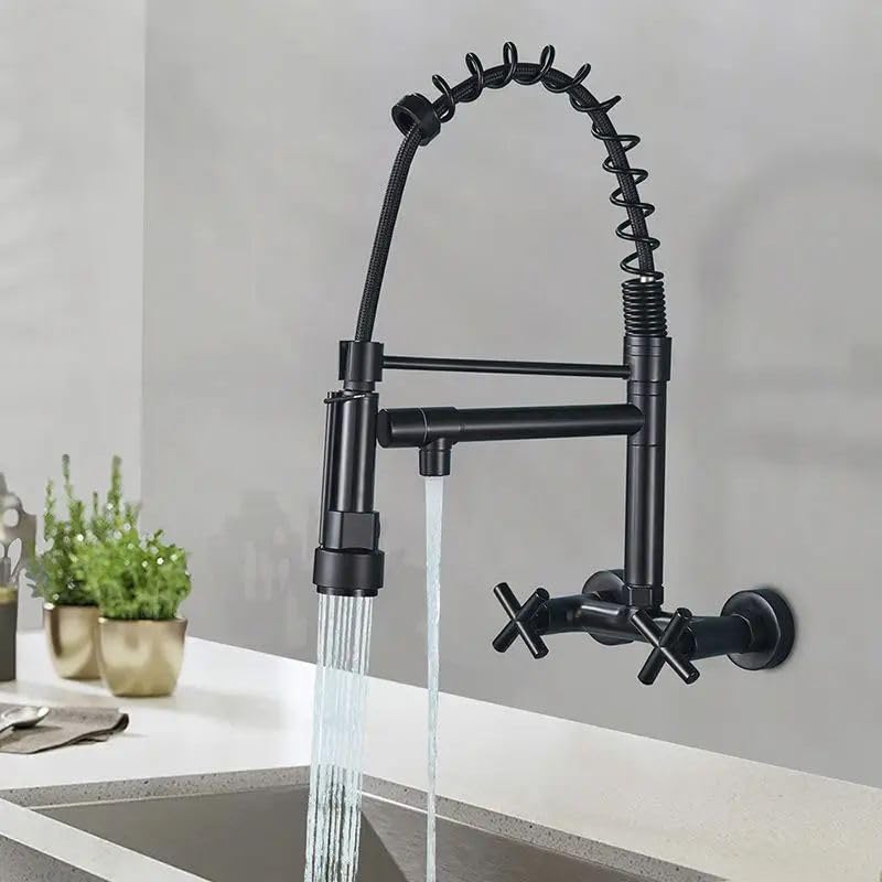 InArt wall mounted kitchen sink tap in brass with matte black finish, pull-down sprayer and single lever