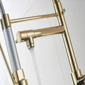 InArt pull out kitchen sink tap showing multi-function spray head and retractable hose in golden finish