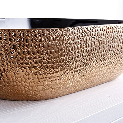 InArt luxury wash basin, ceramic oval table top basin design in black rose gold, top angle view