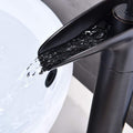InArt long body basin tap in matte black brass, close-up of single lever handle and bamboo design detailing