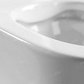 9 inch S trap commode outlet detail on glossy white ceramic one-piece western toilet for Indian bathrooms