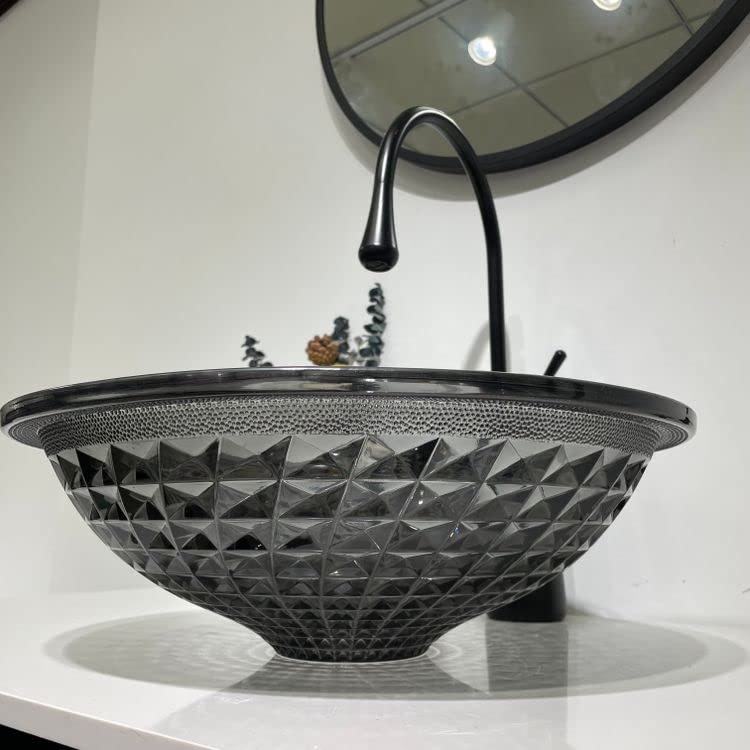 Close-up of glossy black tempered glass table top wash basin rim and crystal finish, premium sanitaryware
