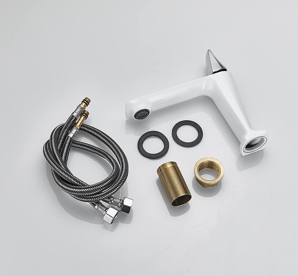 Modern bathroom interior wash basin with mixer tap in white silver finish, single lever brass basin mixer