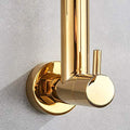 Kitchen sink tap wall mount in gold, high-arc spout clearance shown for filling pots and cleaning utensils