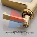 Wash basin tap hot and cold mixer, side angle of waterfall spout and single lever handle in gold finish