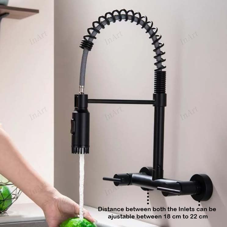 Wall mount kitchen sink faucet in matte black finish with single lever mixer, angled side view