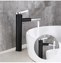 Matte black tall single lever wash basin mixer tap, angled view for modern bathroom basin design
