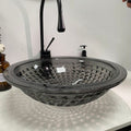 Glass wash basin design in glossy black square, table top wash basin side angle for stylish washroom