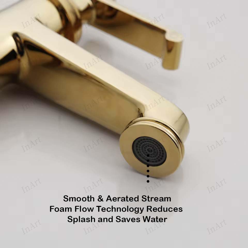 Close-up of InArt waterfall wash basin mixer tap showing gold finish brass body and aerated water flow design