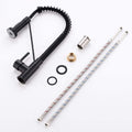 Kitchen sink pull out tap in matte black, pull-down sprayer extended for rinsing in modern kitchen