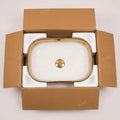 Ceramic table top wash basin with wash basin waste coupling hole, gold finish rectangular basin