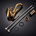 Swan neck basin tap gold finish with aerator spout detail, modern bathroom basin mixer tap