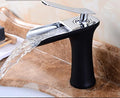 InArt wash basin mixer single lever tap in black silver, angled view with waterfall spout for washroom basin