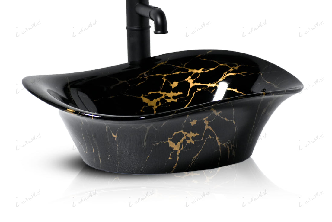 InArt washbasindesign ceramic rectangular table top wash basin in black gold finish, main front view