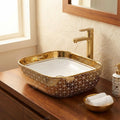 InArt ceramic table top wash basin counter design, gold finish rim and smooth glaze close-up