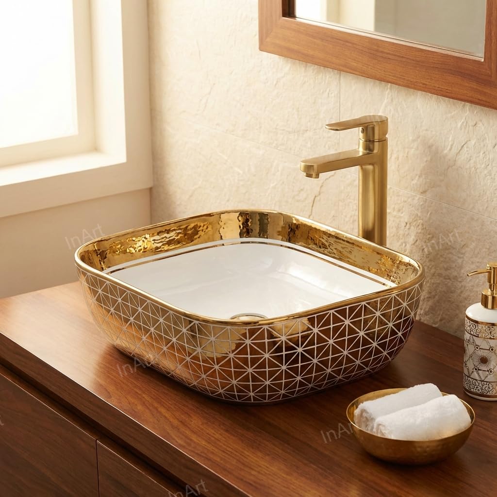 InArt ceramic table top wash basin counter design, gold finish rim and smooth glaze close-up