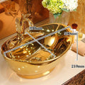 Gold colour wash basin in premium ceramic oval table top style for luxury bathroom interior, close-up detail