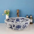InArt designer table top basin design in blue ceramic, angled view for bathroom counter