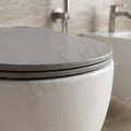 Side profile showing space-saving wall hung commode design in grey ceramic for small bathroom layouts
