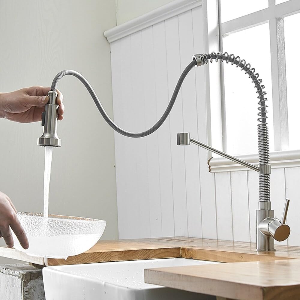 Close-up of InArt tap with spray nozzle and brushed chrome texture, pull-down sprayer for kitchen sink mixer