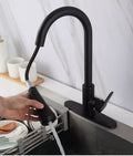 InArt black tap for kitchen sink showing swivel spout movement and pull out hose, functional view
