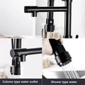 Black sink mixer with pull out spray, angled view showing 360° swivel spout and flexible hose