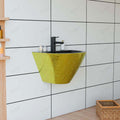 Small wash basin wall mounted in black with gold detailing, rectangular ceramic wall hung sink, side angle