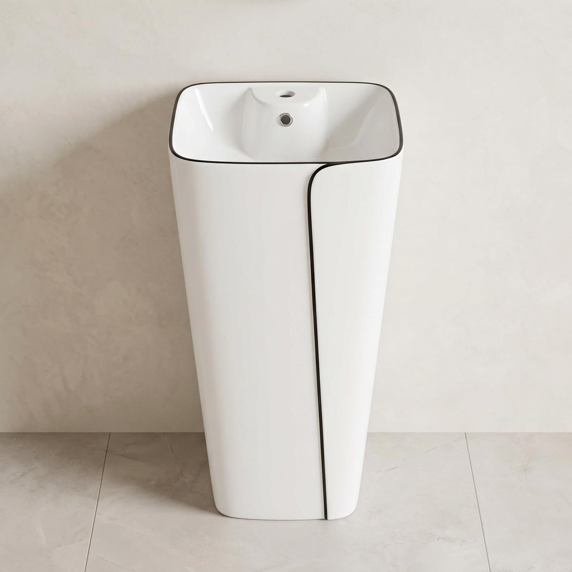 Designer pedestal wash basin design in black and white, square ceramic freestanding basin angled view