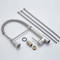 InArt tap mixer for sink with flexible pull-out hose and high-arc spout, close-up on handle and nozzle