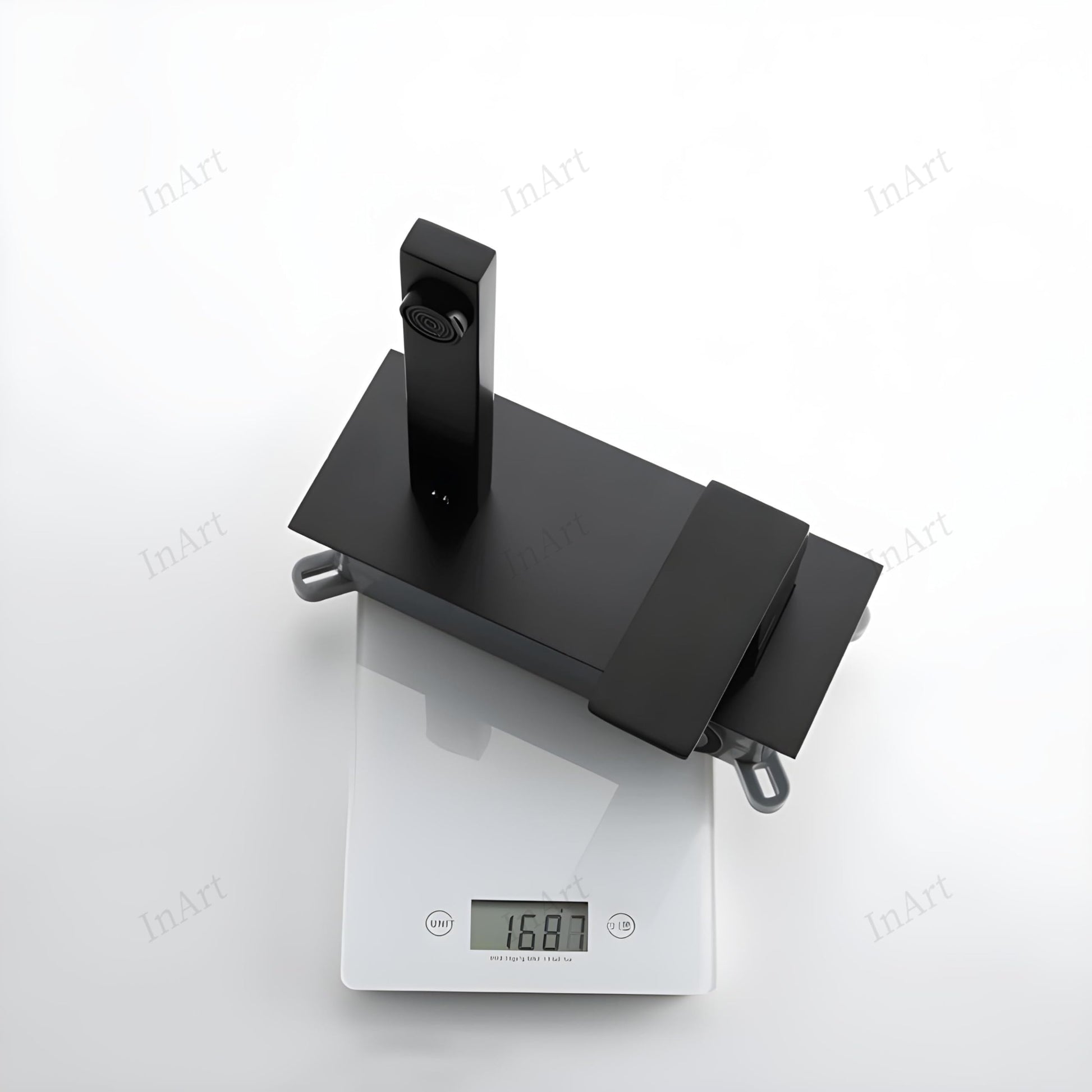 InArt single lever wall mixer tap with hot and cold marking, close-up of matte black brass basin tap wall mounted