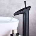 Designer basin mixer tap in matte black, tall black basin mixer with single lever, side angle for bathroom wash basin