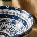 InArt table top wash basin design for bathroom, round blue basin on counter with tap and cabinet