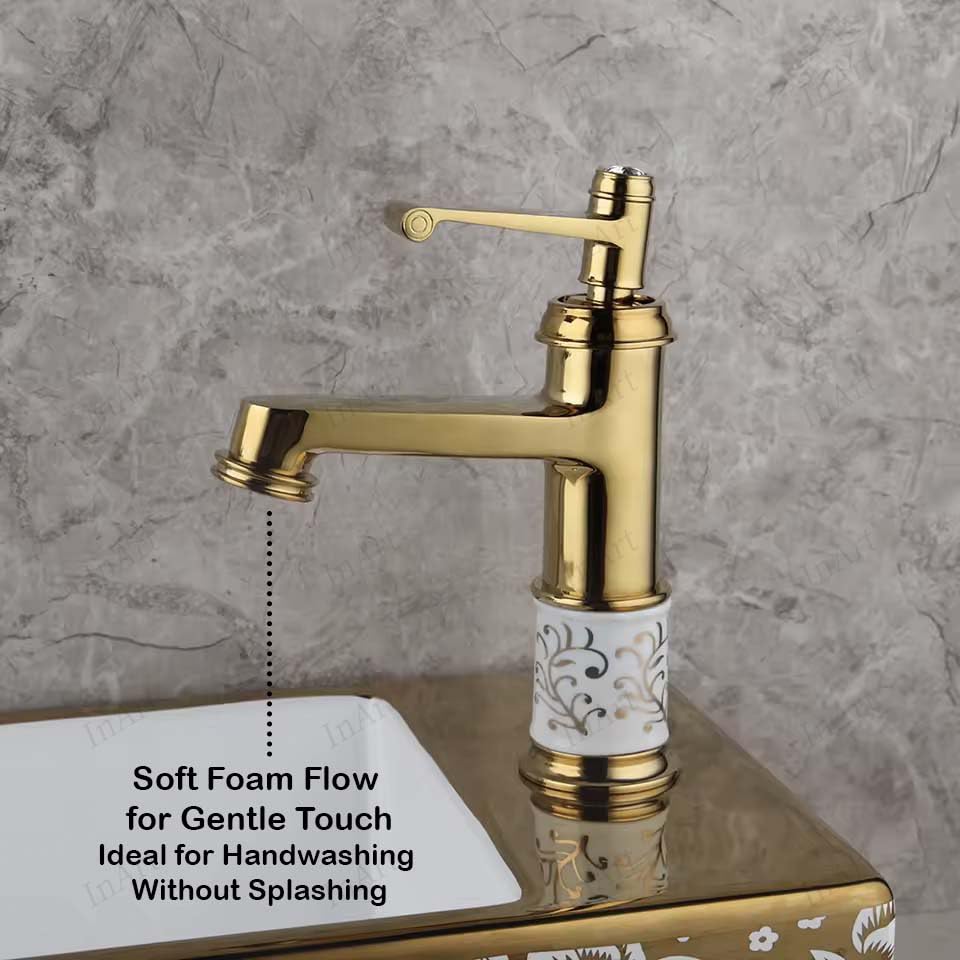 Gold finish single lever basin mixer tap, angled view showing waterfall spout for modern bathroom wash basin