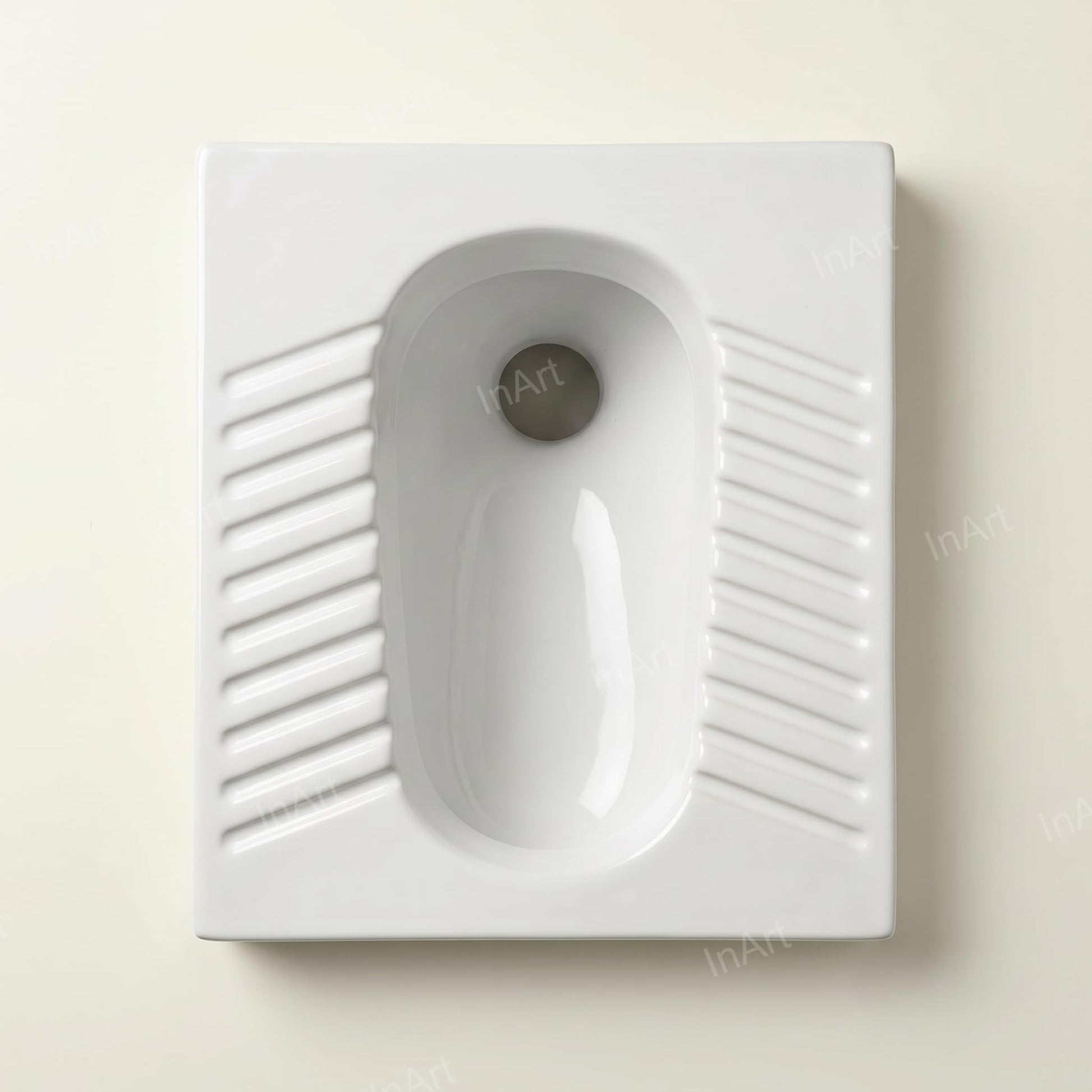 Top view of rectangular squat toilet pan with smooth white glazed ceramic surface