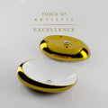 Designer table top basin design in white-gold ceramic, angled view for modern bathroom