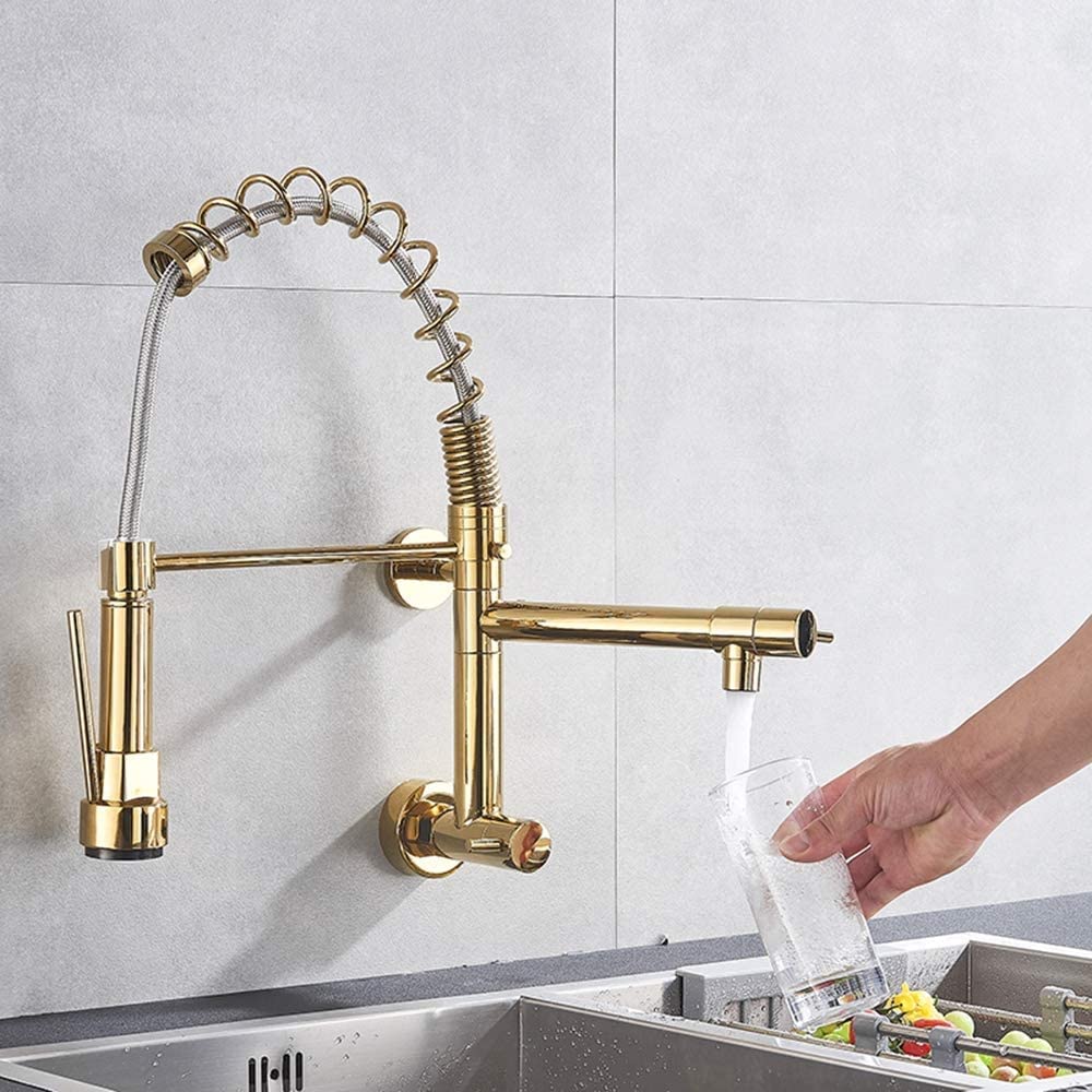 Sink mixer wall mounted in brass with gold finish, detail of single lever handle and smooth cartridge control