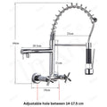 Kitchen sink tap wall mount in gold finish, angled view with pull-down spray head and flexible hose