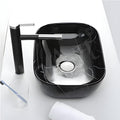 InArt designer ceramic table top wash basin in black, top angle showing rectangular counter basin shape